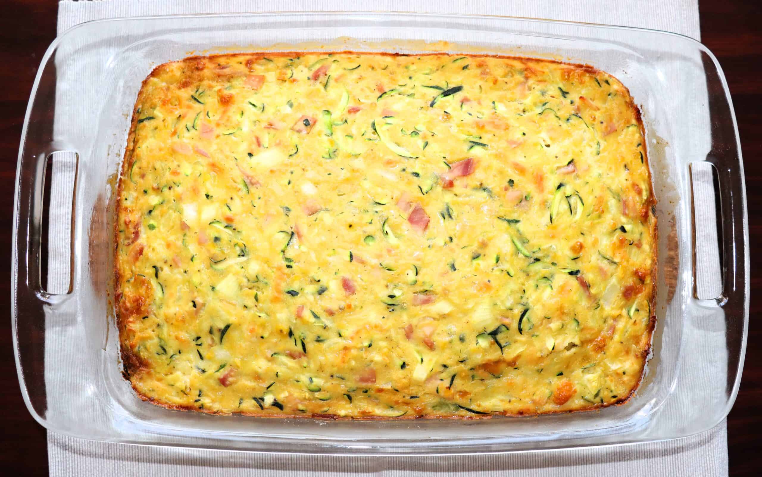 Cooked zucchini slice on grey placemat